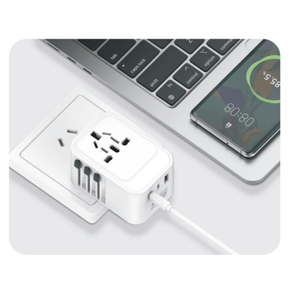 xZone X-TA20 travel adapter charging a laptop and smartphone simultaneously