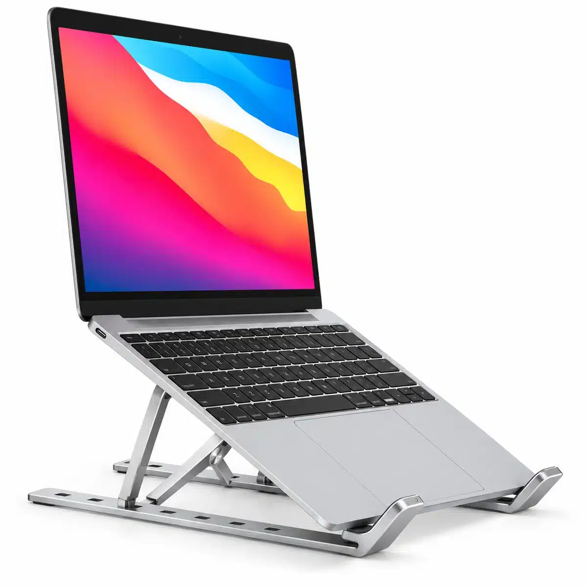 Foldable Adjustable Aluminium Laptop Stand (7 Levels) – Silver 1 Silver foldable laptop stand holding a laptop at a raised angle