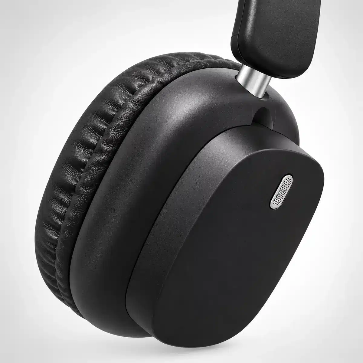 Gx-7 Wireless Noise Cancelling Headphones With Mic 3 GX-7 headphones ear cup close-up with silver slider and mic grille
