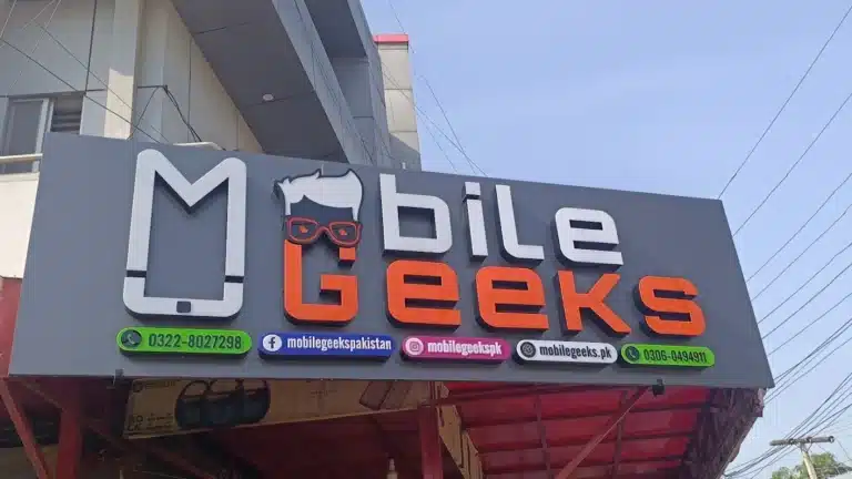 Home 54 Mobile Geeks store sign at Ali Heights Plaza, Johar Town, Lahore