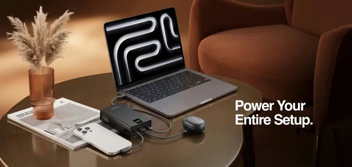 Zero Lifestyle Pulse Pro 200 20000Mah 65W Power Bank 3 Zero Pulse Pro 200 charging a MacBook, an iPhone and earbuds on a table